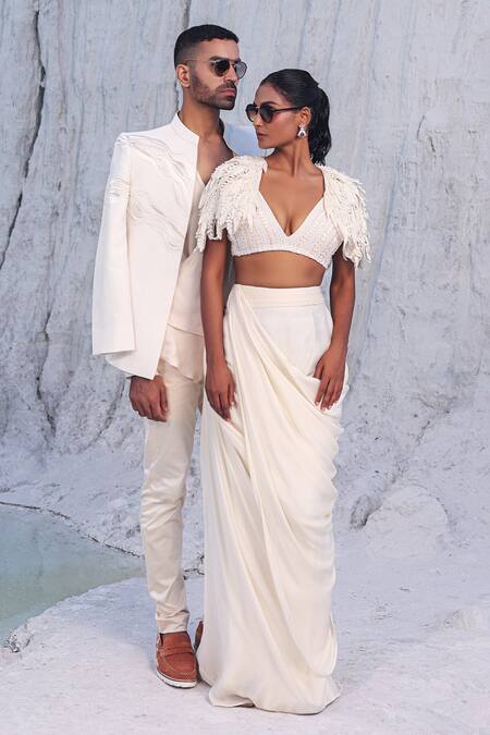 PIRI INDIA Ivory Satin, Net, Chanderi, Kairi 3d Cutwork Embroidered Cape And Draped Skirt Set Online at Aza Fashions PIRI INDIA_Ivory Satin, Net, Chanderi, Kairi 3d Cutwork Embroidered Cape And Draped Skirt Set _Online_at_Aza_Fashions