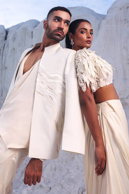 Buy PIRI INDIA Ivory Satin, Net, Chanderi, Kairi 3d Cutwork Embroidered Cape And Draped Skirt Set Online at Aza Fashions Buy_PIRI INDIA_Ivory Satin, Net, Chanderi, Kairi 3d Cutwork Embroidered Cape And Draped Skirt Set _Online_at_Aza_Fashions