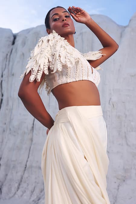 Buy PIRI INDIA Ivory Satin, Net, Chanderi, Kairi 3d Cutwork Embroidered Cape And Draped Skirt Set Buy_PIRI INDIA_Ivory Satin, Net, Chanderi, Kairi 3d Cutwork Embroidered Cape And Draped Skirt Set