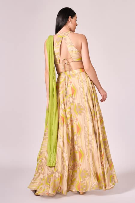 Shop Koswi Green Viscose Bandeau Neck Geometric Print Lehenga Set at Aza Fashions Shop_Koswi_Green Viscose Bandeau Neck Geometric Print Lehenga Set _at_Aza_Fashions