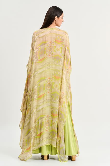 Shop Koswi Green Viscose Sweetheart Neck Solid Lehenga Set With Printed Cape at Aza Fashions Shop_Koswi_Green Viscose Sweetheart Neck Solid Lehenga Set With Printed Cape _at_Aza_Fashions