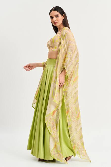 Shop Koswi Green Viscose Sweetheart Neck Solid Lehenga Set With Printed Cape Online at Aza Fashions Shop_Koswi_Green Viscose Sweetheart Neck Solid Lehenga Set With Printed Cape _Online_at_Aza_Fashions