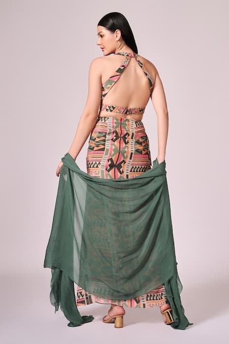 Shop Koswi Green Viscose Round Neck Cape And Geometric Print Skirt Set at Aza Fashions Shop_Koswi_Green Viscose Round Neck Cape And Geometric Print Skirt Set _at_Aza_Fashions