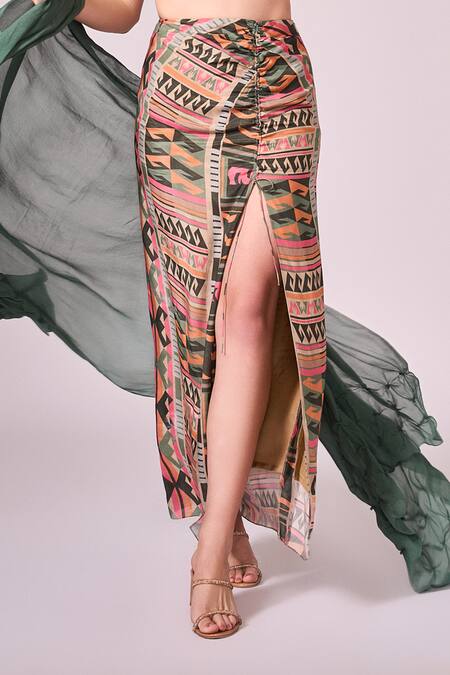 Shop Koswi Green Viscose Round Neck Cape And Geometric Print Skirt Set Online at Aza Fashions Shop_Koswi_Green Viscose Round Neck Cape And Geometric Print Skirt Set _Online_at_Aza_Fashions