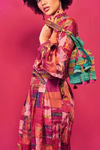 Shop_CAPISVIRLEO_Green Embroidery, Tassels Poso Floral Crochet Potli Bag _Online_at_Aza_Fashions