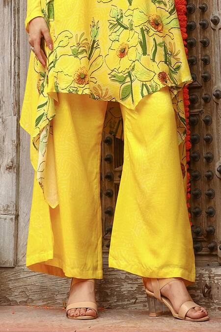 Gazab by Miku Kumar Yellow Muslin Embroidery Round Neck Aria Asymmetric Kurta With Palazzo at Aza Fashions Gazab by Miku Kumar_Yellow Muslin Embroidery Round Neck Aria Asymmetric Kurta With Palazzo _at_Aza_Fashions