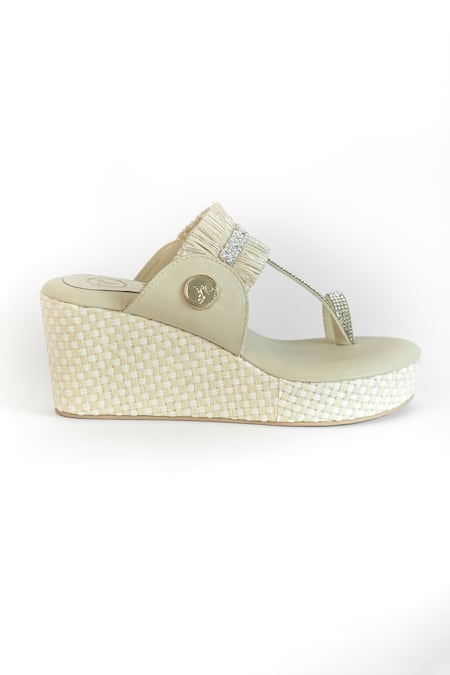 Shop Sana K luxurious Footwear Beige Rhinestones, Fringe And Tassel Embellished Kolhapuri Wedges Online at Aza Fashions Shop_Sana K luxurious Footwear_Beige Rhinestones, Fringe And Tassel Embellished Kolhapuri Wedges _Online_at_Aza_Fashions