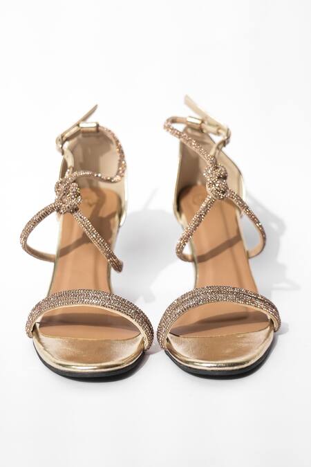 Sana K luxurious Footwear Gold Rhinestones Dior Embellished Knot Heels Online at Aza Fashions Sana K luxurious Footwear_Gold Rhinestones Dior Embellished Knot Heels _Online_at_Aza_Fashions