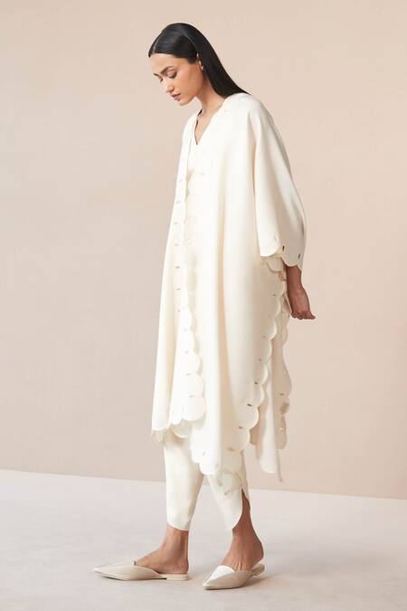 Ampm Ivory Wool Cut Work Alea Scallop Hem Cape With Dhoti Pant Set at Aza Fashions Ampm_Ivory Wool Cut Work Alea Scallop Hem Cape With Dhoti Pant Set _at_Aza_Fashions