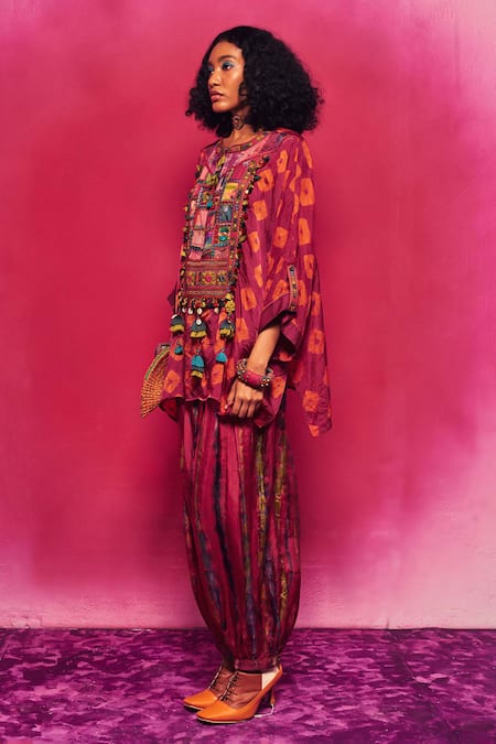 Shop Capisvirleo Fuchsia Silk Tassels, Embroidery Round Ruhi Asymmetric Kurta With Dhoti Pant Online at Aza Fashions Shop_Capisvirleo_Fuchsia Silk Tassels, Embroidery Round Ruhi Asymmetric Kurta With Dhoti Pant _Online_at_Aza_Fashions