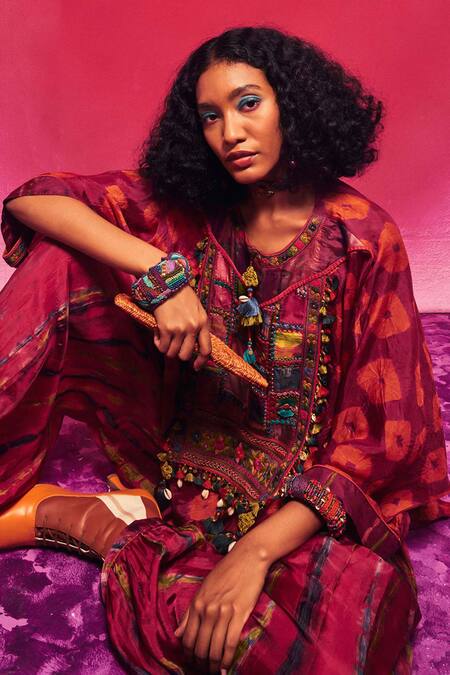 Buy Capisvirleo Fuchsia Silk Tassels, Embroidery Round Ruhi Asymmetric Kurta With Dhoti Pant Buy_Capisvirleo_Fuchsia Silk Tassels, Embroidery Round Ruhi Asymmetric Kurta With Dhoti Pant