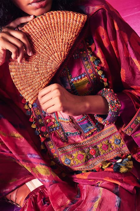 Shop Capisvirleo Fuchsia Silk Tassels, Embroidery Round Ruhi Asymmetric Kurta With Dhoti Pant Shop_Capisvirleo_Fuchsia Silk Tassels, Embroidery Round Ruhi Asymmetric Kurta With Dhoti Pant