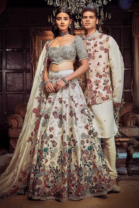 Buy Matsya Ivory Silk, Organza Sequins, Zari, The Royal Satire Raw Bridal Lehenga Set Online at Aza Fashions Buy_Matsya_Ivory Silk, Organza Sequins, Zari, The Royal Satire Raw Bridal Lehenga Set _Online_at_Aza_Fashions