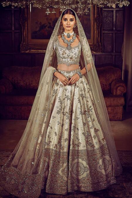 Matsya_Ivory Silk, Net The Masai Landscape Aurum Aged Embroidered Bridal Lehenga Set _at_Aza_Fashions