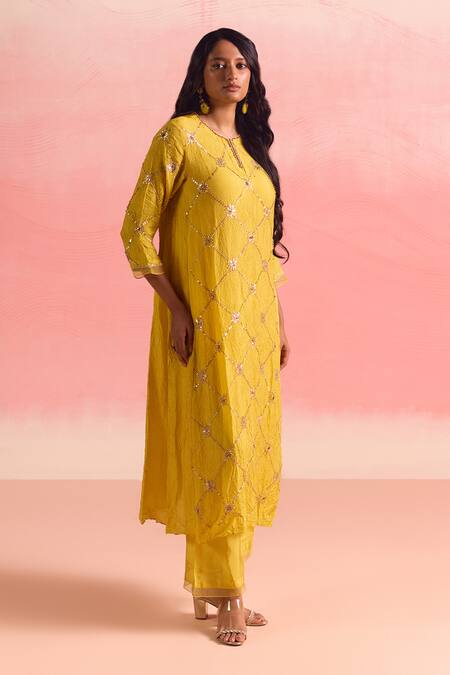 One Not Two Yellow Silk, Cotton Sequins, Crystals, Criss Cross Embroidered Kurta And Pant Set at Aza Fashions One Not Two_Yellow Silk, Cotton Sequins, Crystals, Criss Cross Embroidered Kurta And Pant Set _at_Aza_Fashions
