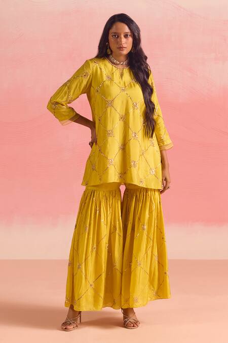 Buy One Not Two Yellow Silk, Cotton Sequins, Criss Cross Embroidered Short Kurta With Gharara Online at Aza Fashions Buy_One Not Two_Yellow Silk, Cotton Sequins, Criss Cross Embroidered Short Kurta With Gharara _Online_at_Aza_Fashions