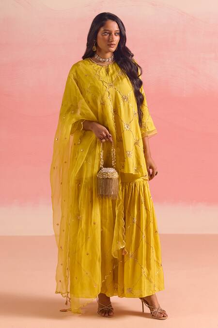 One Not Two Yellow Silk, Cotton Sequins, Criss Cross Embroidered Short Kurta With Gharara at Aza Fashions One Not Two_Yellow Silk, Cotton Sequins, Criss Cross Embroidered Short Kurta With Gharara _at_Aza_Fashions