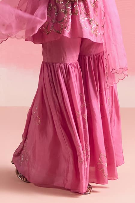 One Not Two Pink Silk, Cotton Sequins, Crystals, Floral Motif Short Kurta With Gharara at Aza Fashions One Not Two_Pink Silk, Cotton Sequins, Crystals, Floral Motif Short Kurta With Gharara _at_Aza_Fashions