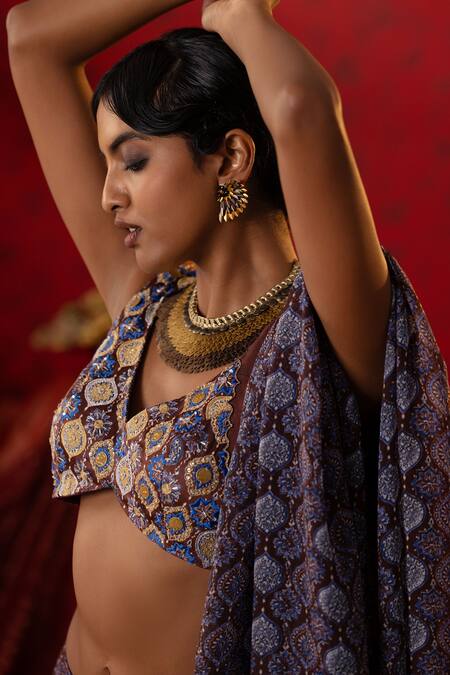 Pooja Bagaria Blue Satin, Organza Sequins, Cut Work V-neck Jaal Ajrakh Print Lehenga Set at Aza Fashions Pooja Bagaria_Blue Satin, Organza Sequins, Cut Work V-neck Jaal Ajrakh Print Lehenga Set _at_Aza_Fashions