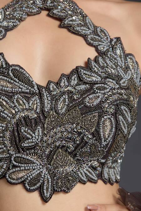 Chaashni By Maansi And Ketan Grey Net Sequins, Beads Halter Neck Embroidered Fishcut Lehenga Set at Aza Fashions Chaashni By Maansi And Ketan_Grey Net Sequins, Beads Halter Neck Embroidered Fishcut Lehenga Set _at_Aza_Fashions