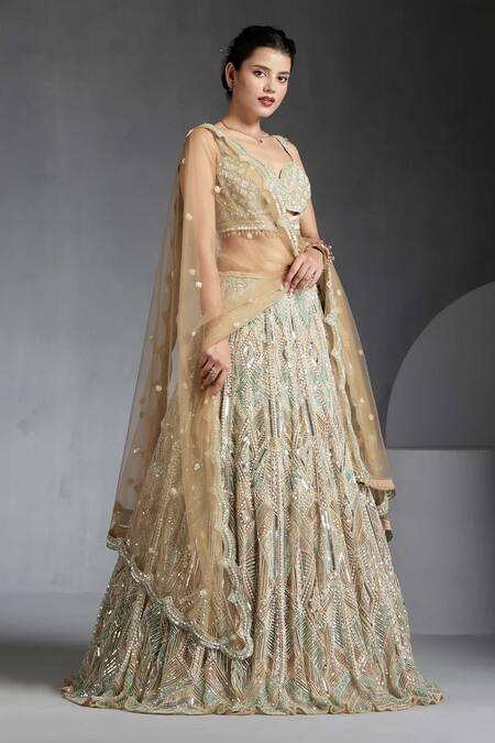 Shop Chaashni By Maansi And Ketan Gold Net Sequins, Beads, Cut Work Embroidered Lehenga Blouse Set Online at Aza Fashions Shop_Chaashni By Maansi And Ketan_Gold Net Sequins, Beads, Cut Work Embroidered Lehenga Blouse Set _Online_at_Aza_Fashions