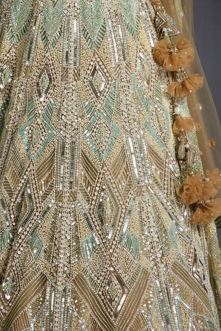 Chaashni By Maansi And Ketan Gold Net Sequins, Beads, Cut Work Embroidered Lehenga Blouse Set at Aza Fashions Chaashni By Maansi And Ketan_Gold Net Sequins, Beads, Cut Work Embroidered Lehenga Blouse Set _at_Aza_Fashions