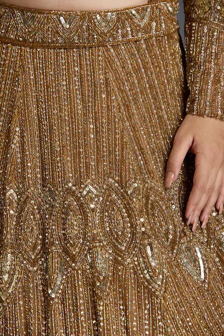 Chaashni By Maansi And Ketan_Gold Net Sequins, Cut Work Plunge Neck Zircons Embroidered Lehenga Set _at_Aza_Fashions