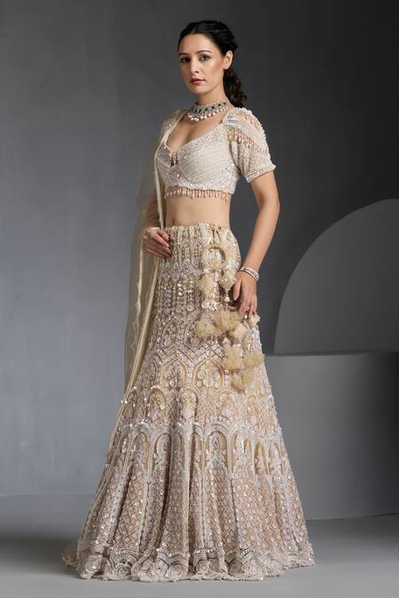 Buy_Chaashni By Maansi And Ketan_Ivory Net Pearls, Sequins, Stones Round Neck Embroidered Lehenga Blouse Set _Online_at_Aza_Fashions