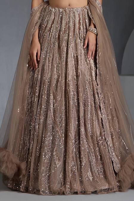Chaashni By Maansi And Ketan_Beige Net Sequins, Beads, Cut Work Metallic Wave Embellished Lehenga Set _Online_at_Aza_Fashions