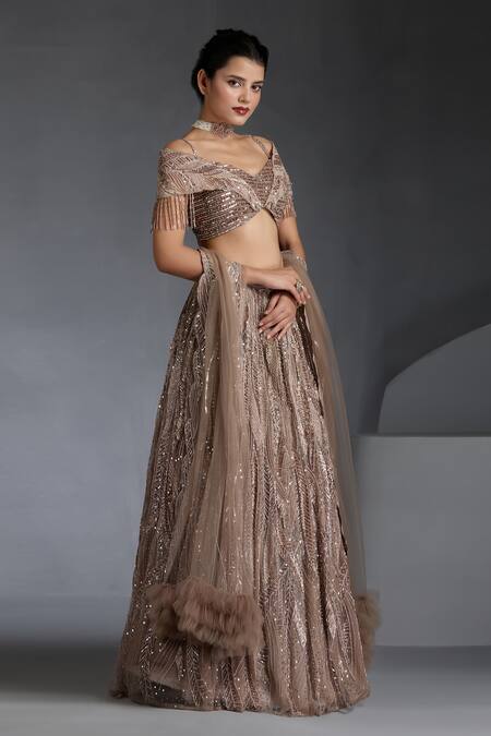 Chaashni By Maansi And Ketan_Beige Net Sequins, Beads, Cut Work Metallic Wave Embellished Lehenga Set _at_Aza_Fashions