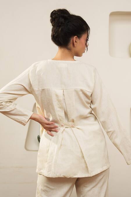 Shop Ourdve Beige Cotton Embroidery V-neck Overlap Top And Pant Set at Aza Fashions Shop_Ourdve_Beige Cotton Embroidery V-neck Overlap Top And Pant Set _at_Aza_Fashions