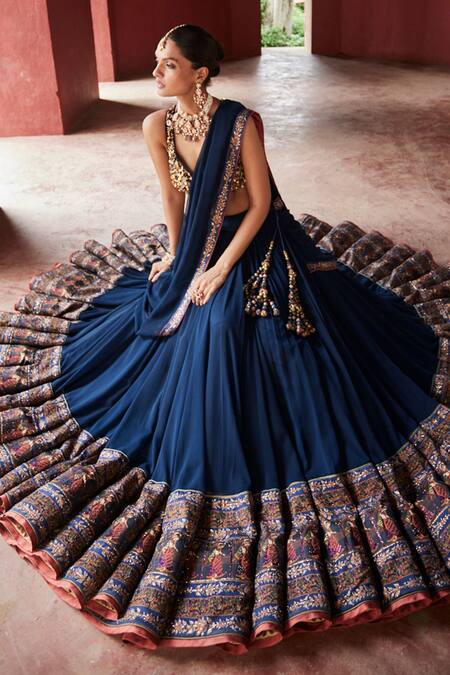 Reynu Taandon_Blue Georgette Crystals, Stones Kalamkari Print Border Lehenga Saree With Blouse _at_Aza_Fashions
