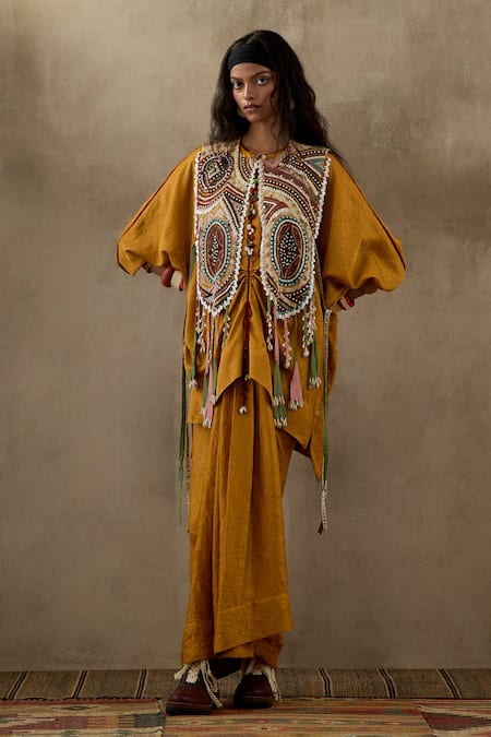 Aseem Kapoor Yellow Cotton, Silk, Crepe Tassels Zuri Tribal Embroidered Gilet And Skirt Set Online at Aza Fashions Aseem Kapoor_Yellow Cotton, Silk, Crepe Tassels Zuri Tribal Embroidered Gilet And Skirt Set _Online_at_Aza_Fashions