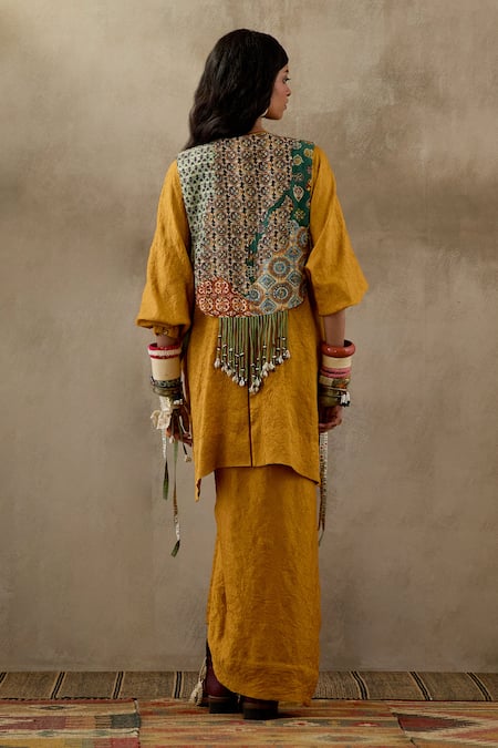 Shop Aseem Kapoor Yellow Cotton, Silk, Crepe Tassels Zuri Tribal Embroidered Gilet And Skirt Set at Aza Fashions Shop_Aseem Kapoor_Yellow Cotton, Silk, Crepe Tassels Zuri Tribal Embroidered Gilet And Skirt Set _at_Aza_Fashions