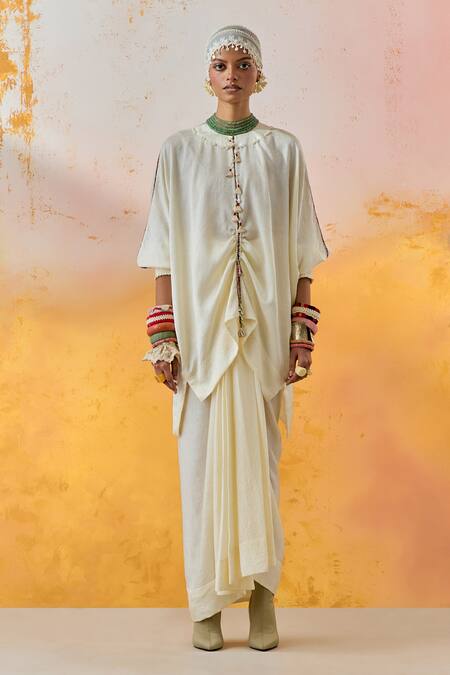 Shop Aseem Kapoor White Crepe, Silk Tassels Round Neck Trapeze Short Kurta With Draped Skirt Online at Aza Fashions Shop_Aseem Kapoor_White Crepe, Silk Tassels Round Neck Trapeze Short Kurta With Draped Skirt _Online_at_Aza_Fashions
