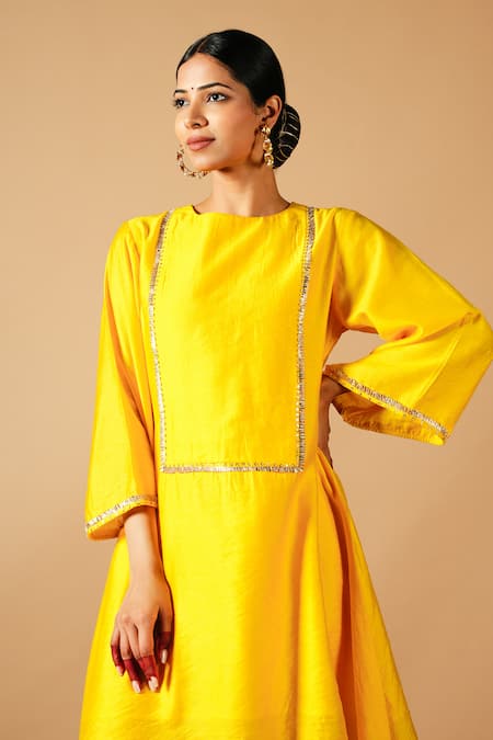 Tangerine By Asfa Yellow Chanderi Silk Gota Patti Boat Neck Asymmetric Kurta With Pant Online at Aza Fashions Tangerine By Asfa_Yellow Chanderi Silk Gota Patti Boat Neck Asymmetric Kurta With Pant_Online_at_Aza_Fashions