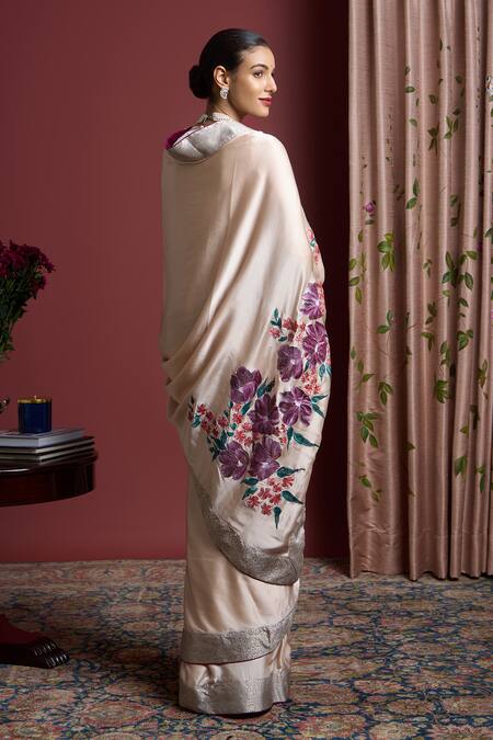 Shop Akutee Peach Satin, Shailaja Floral Handpainted Saree With Unstitched Blouse Piece at Aza Fashions Shop_Akutee_Peach Satin, Shailaja Floral Handpainted Saree With Unstitched Blouse Piece_at_Aza_Fashions