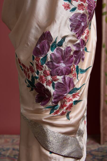 Akutee Peach Satin, Shailaja Floral Handpainted Saree With Unstitched Blouse Piece at Aza Fashions Akutee_Peach Satin, Shailaja Floral Handpainted Saree With Unstitched Blouse Piece_at_Aza_Fashions