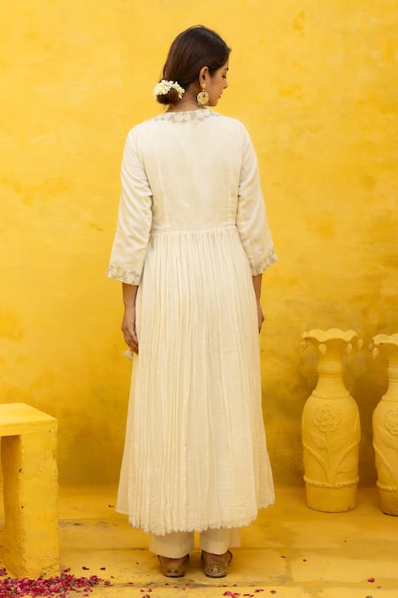 Shop Mithi Supari Ivory Chanderi Beads, Zari V-neck Rasha Embroidered Angarkha Anarkali Set at Aza Fashions Shop_Mithi Supari_Ivory Chanderi Beads, Zari V-neck Rasha Embroidered Angarkha Anarkali Set _at_Aza_Fashions
