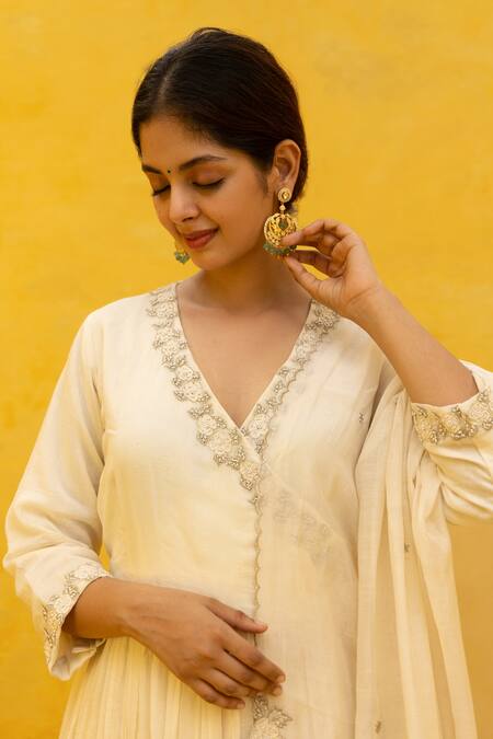 Mithi Supari Ivory Chanderi Beads, Zari V-neck Rasha Embroidered Angarkha Anarkali Set Online at Aza Fashions Mithi Supari_Ivory Chanderi Beads, Zari V-neck Rasha Embroidered Angarkha Anarkali Set _Online_at_Aza_Fashions