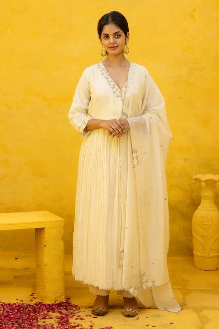 Buy Mithi Supari Ivory Chanderi Beads, Zari V-neck Rasha Embroidered Angarkha Anarkali Set Online at Aza Fashions Buy_Mithi Supari_Ivory Chanderi Beads, Zari V-neck Rasha Embroidered Angarkha Anarkali Set _Online_at_Aza_Fashions