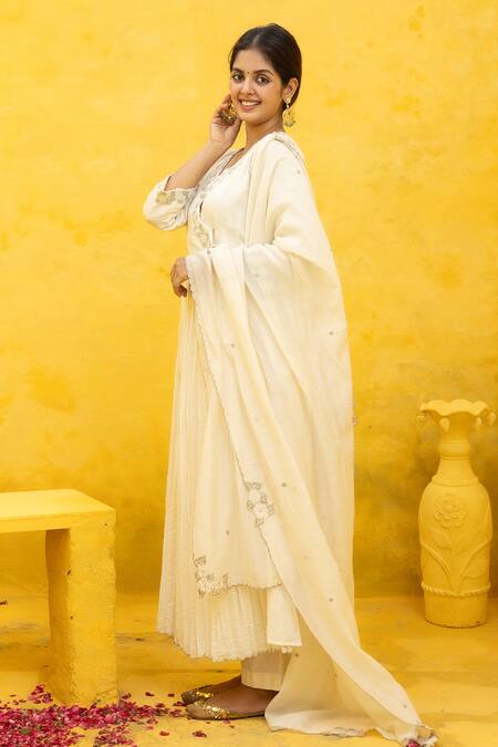 Mithi Supari Ivory Chanderi Beads, Zari V-neck Rasha Embroidered Angarkha Anarkali Set at Aza Fashions Mithi Supari_Ivory Chanderi Beads, Zari V-neck Rasha Embroidered Angarkha Anarkali Set _at_Aza_Fashions
