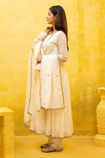 Buy Mithi Supari Ivory Chanderi, Cotton, Linen Embroidery, Zari Gayatri Zardozi Angrakha Set Online at Aza Fashions Buy_Mithi Supari_Ivory Chanderi, Cotton, Linen Embroidery, Zari Gayatri Zardozi Angrakha Set _Online_at_Aza_Fashions