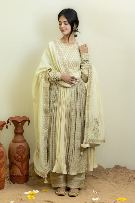 Mithi Supari_Ivory Chanderi, Cotton Tassels, Embroidery Mughal Floral Woven Anarkali Set _Online_at_Aza_Fashions