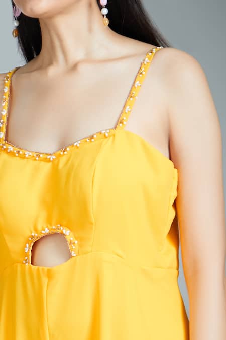 Samyukta Singhania_Yellow Georgette Pearls, Beads Sweetheart Neck Cut-out Strappy Jumpsuit _at_Aza_Fashions
