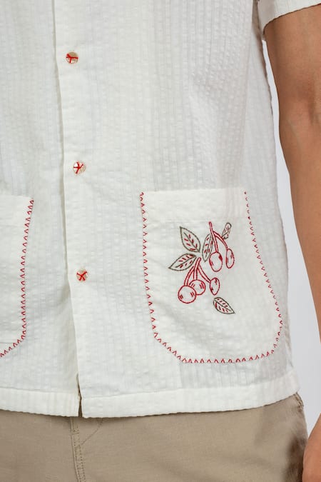 Shop Vaani Beswal Ivory Cotton Seer Sucker Hand Embroidery Cherry Pocket Shirt Online at Aza Fashions Shop_Vaani Beswal_Ivory Cotton Seer Sucker Hand Embroidery Cherry Pocket Shirt _Online_at_Aza_Fashions