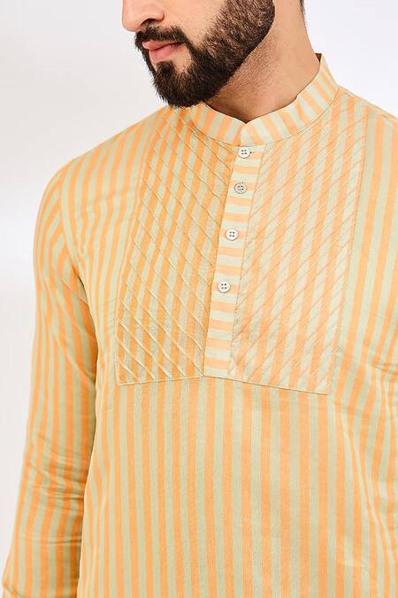 Buy Vaani Beswal Orange Chanderi Stripe Pattern Buttoned Placket Kurta Online at Aza Fashions Buy_Vaani Beswal_Orange Chanderi Stripe Pattern Buttoned Placket Kurta _Online_at_Aza_Fashions