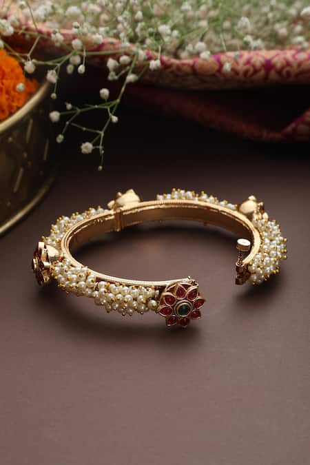Shop Swabhimann Red Pearls, Stones Floral Jadau Bangle at Aza Fashions Shop_Swabhimann_Red Pearls, Stones Floral Jadau Bangle _at_Aza_Fashions