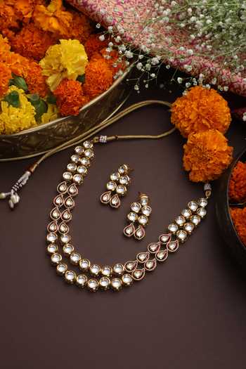 Shop Swabhimann Gold Plated Crystals, Stones Tear Drop Carved Necklace Set at Aza Fashions Shop_Swabhimann_Gold Plated Crystals, Stones Tear Drop Carved Necklace Set _at_Aza_Fashions