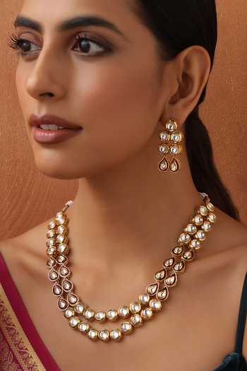 Buy Swabhimann Gold Plated Crystals, Stones Tear Drop Carved Necklace Set Online at Aza Fashions Buy_Swabhimann_Gold Plated Crystals, Stones Tear Drop Carved Necklace Set _Online_at_Aza_Fashions